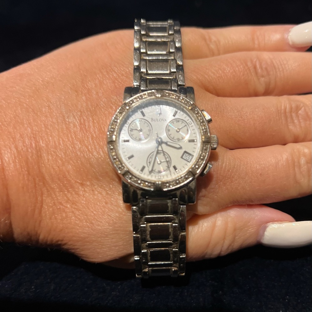 Beautiful Bulova womens watch. Good condition. Silver with white face. No box.